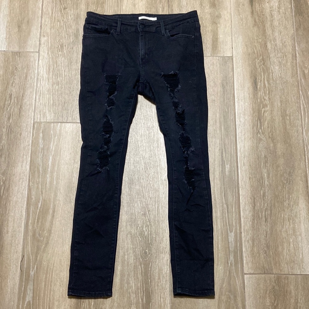 Levi’s 711 distressed skinny jeans 31